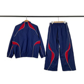 BROKEN PLANET COLOR BLOCK NYLON TRACKSUIT NAVY RED