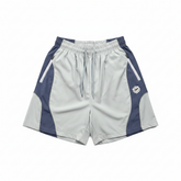 BROKEN PLANET COLOR BLOCK WIND SHORTS LIGHT BLUE NAVY - white background flat lay