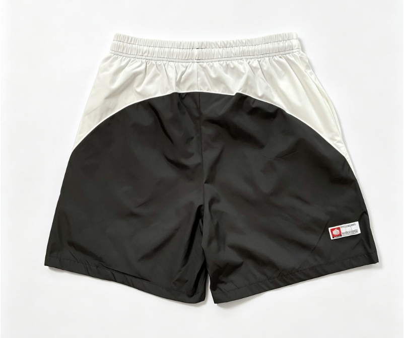 BROKEN PLANET GRAFFITI COLOR‑BLOCK NYLON SHORTS