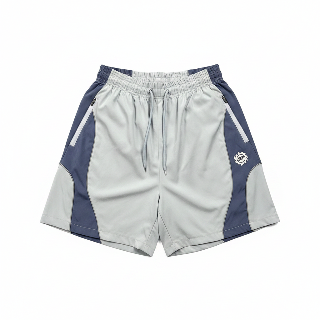 BROKEN PLANET COLOR BLOCK WIND SHORTS LIGHT BLUE NAVY - white background flat lay